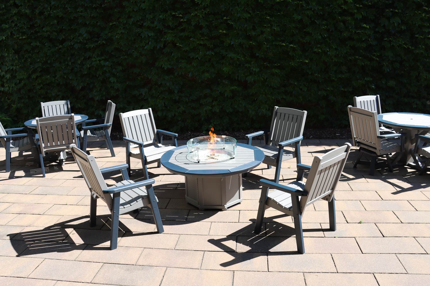 photo of a by the yard fire table and chairs