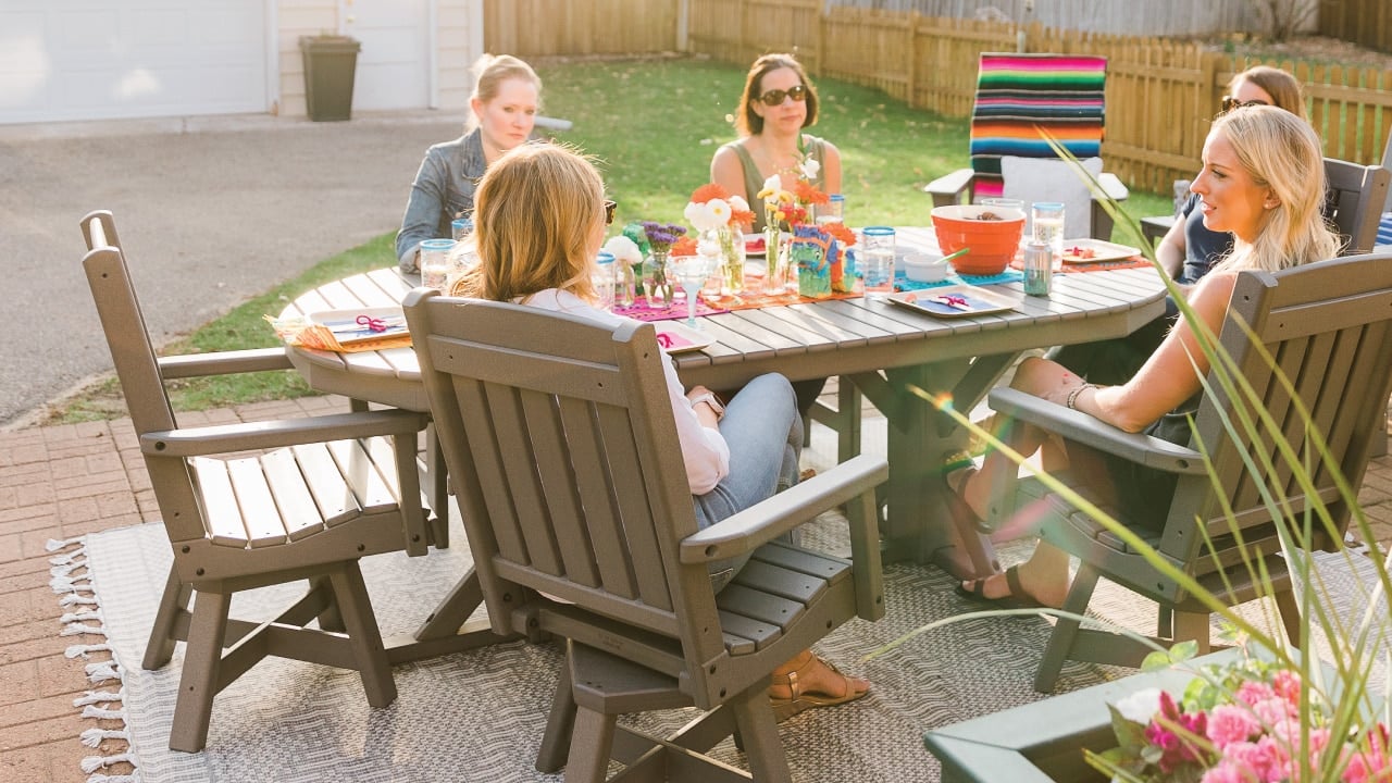 People sitting around a By the Yard table