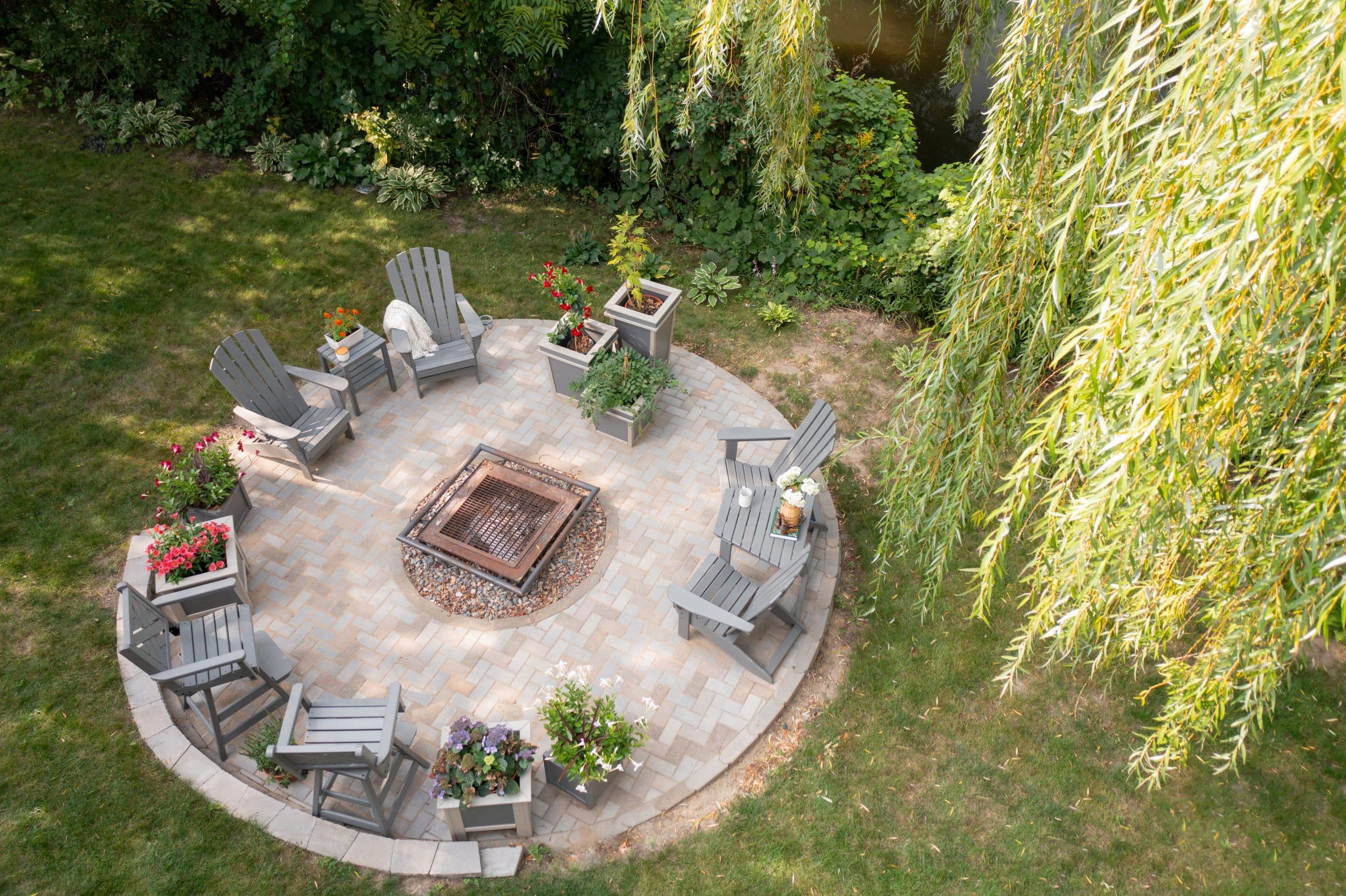 By the Yard chairs around a fire pit