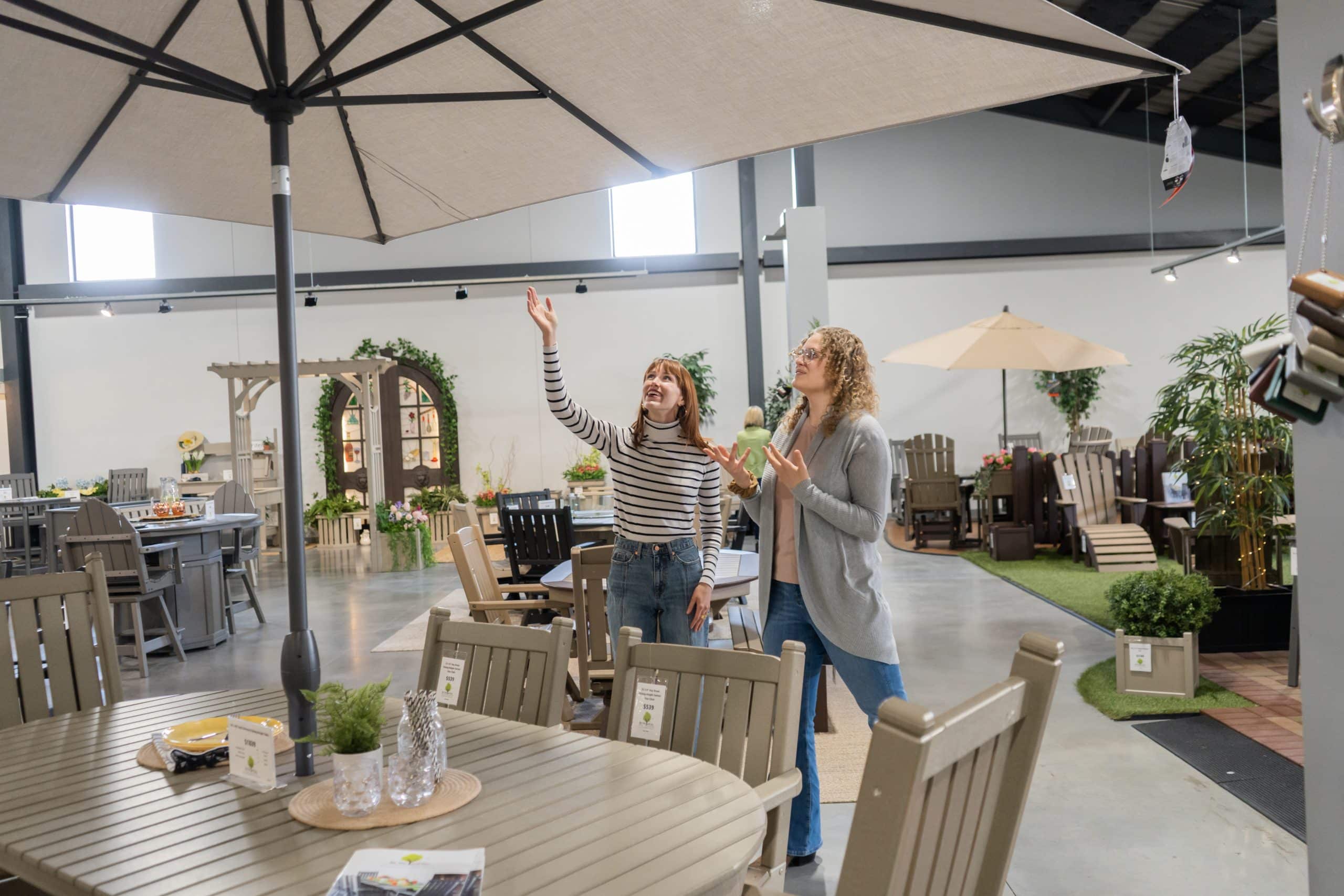 Sales associates in a By the Yard showroom