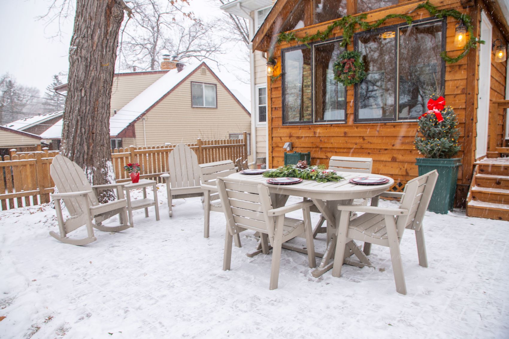 By the Yard tables and chairs outside in the snow