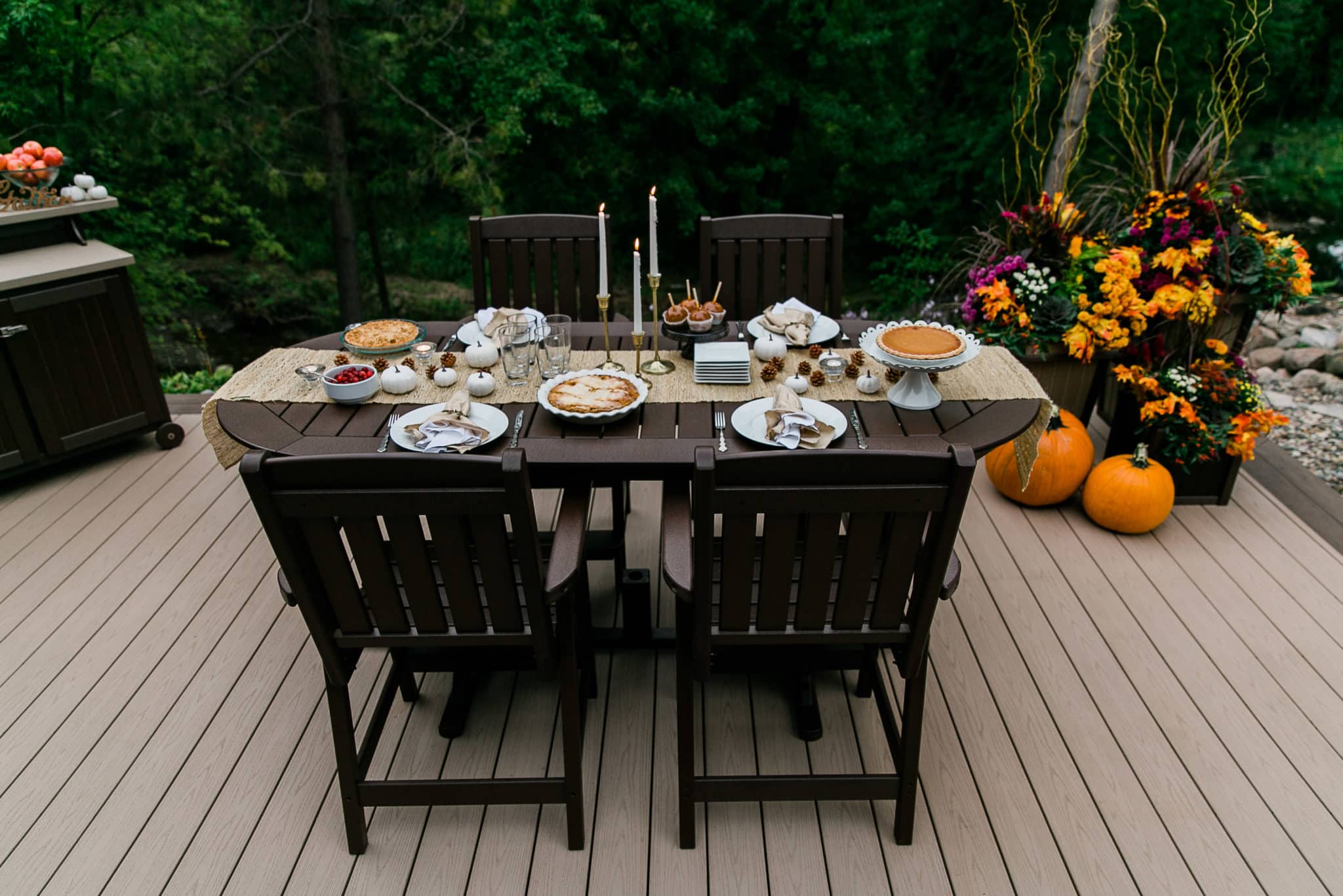 By the Yard outdoor dining set decorated for Thanksgiving