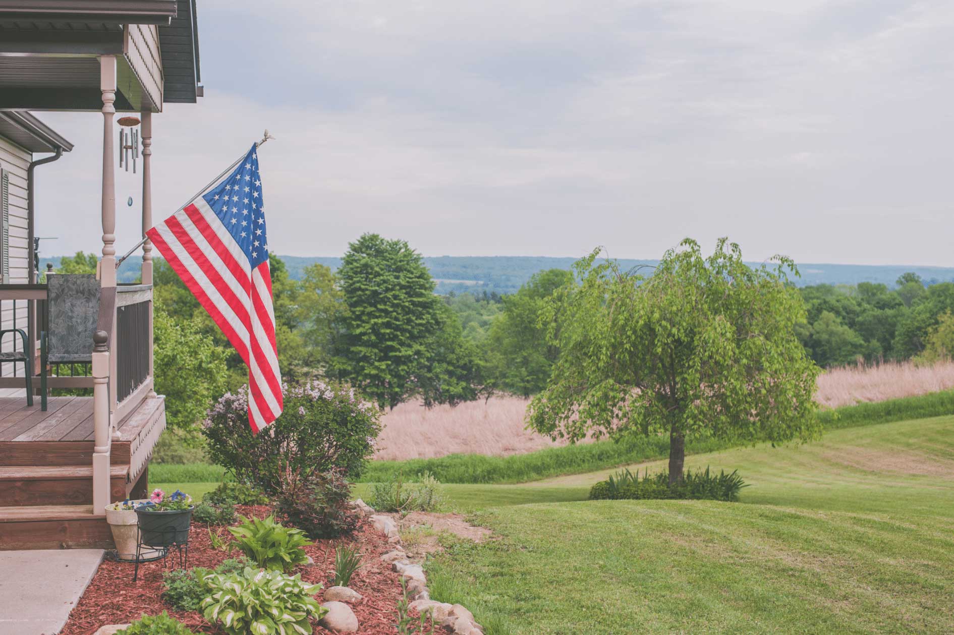 american flag in the countryside